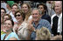 President George W. Bush and Mrs. Laura Bush cheer on players during a Tee Ball game on the South Lawn of the White House between the District 12 Little League Challengers from Williamsport, PA and the West University Little League Challengers from Houston, Texas on Sunday July 24, 2005.