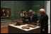 President and Mrs. Bush receive a tour of the Gilbert Stuart Exhibition at the National Gallery of Art, from gallery director Earl " Rusty" Powell III, Monday, July 25, 2005 in Washington.