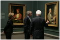 President and Mrs. Bush receive a tour of the Gilbert Stuart Exhibition at the National Gallery of Art, from gallery director Earl "Rusty" Powell III, Monday, July 25, 2005 in Washington.