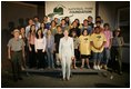 Laura Bush poses for a photo at the Junior Ranger swearing-in ceremony, July 27, 2005, at the Minnesota Science Museum in St. Paul, Minnesota.