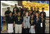 Laura Bush attends the Helping America's Youth Event at the Benjamin S. Carson Honors Preparatory School, Atlanta, Georgia, with debate class, March 9, 2005.