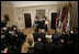 Irish Taoiseach Bertie Ahern delivers remarks before presenting President George W. Bush with the traditional bowl of shamrocks during a St. Patrick's Day Shamrock Ceremony in the Roosevelt Room Thursday, March 17, 2005.