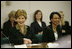 Laura Bush and Secretary of State Condoleezza Rice laugh during a roundtable discussion with women leaders from around the world held in honor of International Women's Day at the State Department in Washington, D.C. Tuesday, March 8, 2005. Today in her remarks at the State Department Mrs. Bush said, "We all have an obligation to speak for women who are denied their rights to learn, to vote or to live in freedom. We may come from different backgrounds, but advancing human rights is the responsibility of all humanity, a commitment shared by people of goodwill on every continent."