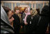 Laura Bush greets Afghan Ministers during her visit to the State Department for an International Women's Day Forum in Washington, D.C., Tuesday, March 8, 2005.