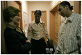 Laura Bush speaks with Kenyatta "Ken" Thigpen, his girlfriend Jewell Reed and their three-year-old son, Kevion, during a visit to the Rosalie Manor Community and Family Services center in Milwaukee, Wis., Tuesday, March 8, 2005. Mrs. Bush credits a New York Times article by Jason DeParle about Mr. Thigpen's determination to be a responsible father with bringing her attention to the needs of boys and young men.