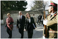 Laura Bush arrives at the Presidential Palace accompanied by U.S. Ambassador to Afghanistan Zalmay Khalilzad and Under Secretary of State for Global Affairs Paula Dobriansky in Kabul, Afghanistan Wednesday, March 30, 2005.