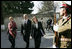 Laura Bush arrives at the Presidential Palace accompanied by U.S. Ambassador to Afghanistan Zalmay Khalilzad and Under Secretary of State for Global Affairs Paula Dobriansky in Kabul, Afghanistan Wednesday, March 30, 2005.