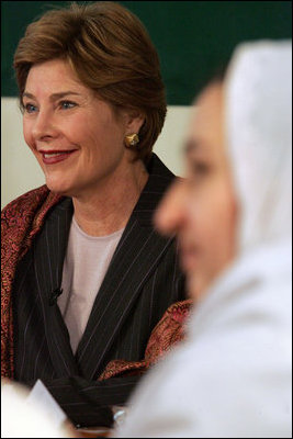 Laura Bush listens to the comments of Afghan teachers and students during a roundtable at the Women’s Teacher’s Training Institute of Kabul University in Kabul, Afghanistan, Wednesday, March 30, 2005.