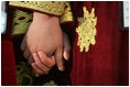 Children from the School of Hope hold hands during a visit by Laura Bush to Kabul University in Kabul, Afghanistan, Wednesday, March 30, 2005.