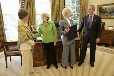 President George W. Bush and Laura Bush meet with Barbara de Marneff and Stephanie Copeland of Edith Wharton Restoration in Massachusetts, in the Oval Office Monday, May 2, 2005. The two women are two of the recipients of the 2005 Preserve America Presidential Award.