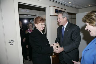 President and Mrs. Bush are greeted aboard Air Force One by Latvian President Vaira Vike-Freiberga after they arrived Friday, May 6, 2005, in Riga. The President and Mrs. Bush are on a four-day visit to Europe that will include stops in Latvia, the Netherlands, Georgia and Russia.