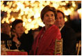 Laura Bush listens to a mariachi band perform during the White House celebration of Cinco de Mayo songs in the Rose Garden of the White House Wednesday, May 4, 2005.