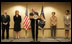 Accompanied by Laura Bush and Secretary of State Condoleezza Rice, President George W. Bush addresses U.S. Embassy families and staff in Latvia Saturday, May 7, 2005. Pictured at left are U.S. Ambassador to Latvia, Catherin T. Bailey, and her husband, Irving Bailey II.