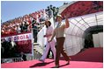 Laura Bush and Sandra Roelofs, wife of Georgian President Mikhail Saakashvili, are introduced before President Bush addresses a crowd of thousands at Freedom Square in Tbilisi, Georgia, Tuesday, May 10, 2005.