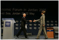 Klaus Schwab, chairman and founder of the World Economic Forum, welcomes Laura Bush to speak at the World Economic Forum at the Dead Sea in Jordan Saturday, May 21, 2005.