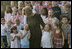 Laura Bush talks with children at the U.S. Embassy in Amman, Jordan, Saturday, May 21, 2005.