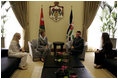 Laura Bush and Liz Cheney, deputy assistant secretary of state for Near Eastern affairs, left, meet with King Abdullah II, center right, and his wife, Queen Rania Al-Abdullah, right, at the World Economic Forum Conference Center at the Dead Sea in Jordan Saturday, May 21, 2005.