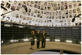 Laura Bush tours the Hall of Names with Gila Katsav, wife of President Moshe Katsav of Israel, left, and General Avner Shalev, chairman of the Yad Vashem Directorate, right, at the Yad Vashem Holocaust museum in Jerusalem, Sunday, May 22, 2005. The Hall of Names is a repository of testimony from millions of Holocaust victims and serves as a memorial to those who died.