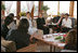 Laura Bush talks with Palestinian women about women's rights at the Jericho Intercontinental Hotel in Jericho, Sunday, May 22, 2005.