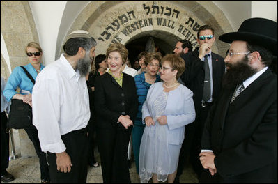 Laura Bush tours the Western Wall in Jerusalem with Rabbi Shmuel Rabinowitz; Gila Katsav, wife of Israeli President Moshe Katsav, center; and Mordechai Suli Eliav, manager of The Western Wall Heritage Foundation, May 22, 2005.