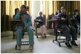 Students at the Discovery School of Swaifiyeh Secondary School in Amman, Jordan, participate in a classroom lesson during Laura Bush's visit to the school Sunday, May 22, 2005.