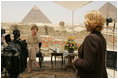 Press Secretary Susan Whitson talks with Laura Bush between television interviews in front of the Giza Pyramids in Giza, Egypt, Monday, May 23, 2005.