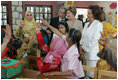 Laura Bush and Suzanne Mubarak, wife of Egyptian President Hosni Mubarak, listen to a classroom lesson at the Girl Friendly School in the Abou Sir neighborhood of Cairo, Egypt, Monday, May 23, 2005. The National Council for Children and Motherhood built the school to provide education for girls living in remote and rural areas.