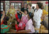 Laura Bush and Suzanne Mubarak, wife of Egyptian President Hosni Mubarak, listen to a classroom lesson at the Girl Friendly School in the Abou Sir neighborhood of Cairo, Egypt, Monday, May 23, 2005. The National Council for Children and Motherhood built the school to provide education for girls living in remote and rural areas.