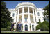 President George W. Bush and Laura Bush welcome the Prince of Wales and Duchess of Cornwall to the White House, Wednesday, Nov. 2, 2005.