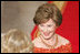 Laura Bush welcomes the Duchess of Cornwall upon the arrival of the Prince of Wales and the Duchess to the White House, Wednesday evening, Nov. 2, 2005.