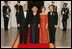 President George W. Bush and Laura Bush welcome the Prince of Wales and Duchess of Cornwall upon their arrival to the White House, Wednesday evening, Nov. 2, 2005.