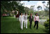 Mrs. Laura Bush walks with women leaders during her visit Friday, Nov. 4, 2005, to Estancia Santa Isabel, a ranch near Mar del Plata, site of the 2005 Summit of the Americas.