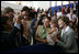 Laura Bush smiles as she greets staff and families at the U.S. Embassy in Brasilia, Brazil Saturday, Nov. 6, 2005.