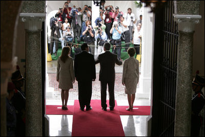 President and Mrs. Bush and President Martin Torrijos of Panama, and Mrs. Torrijos, face the media after the Bush's arrival Monday, Nov. 7, 2005, at the Palacio de Las Garzas in Panama City, Panama.