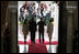 President and Mrs. Bush and President Martin Torrijos of Panama, and Mrs. Torrijos, face the media after the Bush's arrival Monday, Nov. 7, 2005, at the Palacio de Las Garzas in Panama City, Panama.