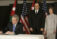 President George W. Bush and Mrs. Laura Bush, visit the Embassy of Jordan to sign a book of condolence, Thursday, Nov. 10, 2005 in Washington, in remembrance of those killed in the terrorist attacks, Wednesday, in Jordan.