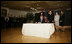 President George W. Bush signs a book of condolence, Thursday, Nov. 10, 2005 at the Embassy of Jordan in Washington, in remembrance of those killed in the terrorist attacks, Wednesday, in Jordan.