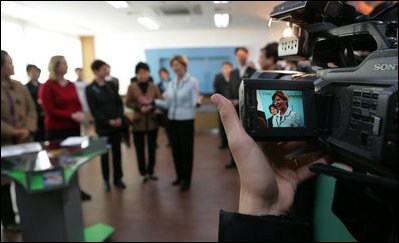 The liquid crystal display of a video camera captures Mrs. Laura Bush as she visits one of three classrooms Thursday, Nov. 17, 2005, at the Gyeongju English Village in Gyeongju, Korea.