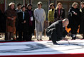 A calligrapher at the Beomeosa Temple in Busan entertains the spouses of APEC leaders Friday, Nov. 18, 2005, during the two-day summit.