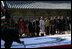 An artist paints calligraphy for the spouses of APEC leaders Friday, Nov. 18, 2005, during their visit to the Beomeosa Temple in Busan, Korea.