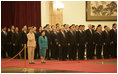 Laura Bush and Madame Liu, wife of President Hu Jintao of China, participate in the welcoming ceremony for President and Mrs. Bush Sunday, Nov. 20, 2005, at the Great Hall of the People in Beijing.