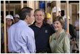 NBC "Today Show" host Matt Lauer talks with President George W. Bush and Laura Bush Tuesday, Oct. 11, 2005, on the construction site of a Habitat for Humanity home in Covington, La., a hurricane-devastated town just north of New Orleans where the nonprofit is building houses for those displaced by Katrina.