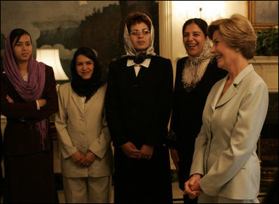 Laura Bush meets with a group of Afghan teachers Wednesday, Oct. 5, 2005, who are training at the University of Nebraska in Omaha on an educational exchange sponsored by the U.S. Department of State's Bureau of Educational and Cultural Affairs and the U.S.-Afghan Women's Council.