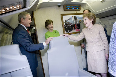 President George W. Bush, Mrs. Bush and Nancy Reagan tour the plane that served as Air Force One for President Reagan and six other Presidents from 1973 to 2001 at the Ronald Reagan Presidential Library in Simi Valley, California, Friday, Oct. 21, 2005.