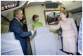 President George W. Bush, Mrs. Bush and Nancy Reagan tour the plane that served as Air Force One for President Reagan and six other Presidents from 1973 to 2001 at the Ronald Reagan Presidential Library in Simi Valley, California, Friday, Oct. 21, 2005.