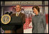 President George W. Bush and Mrs. Bush offer their welcoming remarks, Thursday, Oct. 27, 2005 at Howard University in Washington, to open the White House Conference on Helping America's Youth.