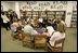 Laura Bush meets Thursday, Sept. 8, 2005 with families from New Orleans, displaced last week as a result of Hurricane Katrina, at the Greenbrook Elementary School in DeSoto County, Miss. Greenbrook Elementary School has enrolled the most displaced students among the DeSoto County schools in Mississippi.