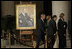 President George W. Bush and Laura Bush walk with Justice Antonin Scalia and Sally Rider, the Chief Justice's assistant, after viewing a portrait of Chief Justice William Rehnquist as his body lies in repose in the Great Hall of the U.S. Supreme Court Tuesday, Sept. 6, 2005.