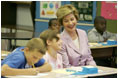 Laura Bush observes a fifth grade math class at Lovejoy Elementary School in Des Moines, Iowa, Thursday, September 8, 2005.