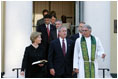 President Bush and First Lady Laura Bush walk with Rev. Luis Leon after attending a Service of Prayer and Remembrance for 9/11 victims at St. John's Episcopal Church in Washington, DC, September 11, 2005. This marks the fourth anniversary of terrorist attacks on both the World Trade Center and The Pentagon.